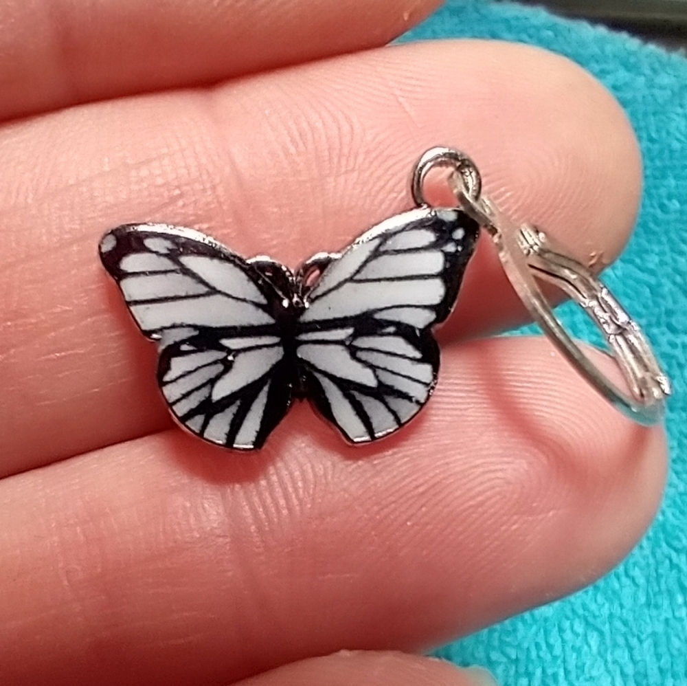 Silvertone black white butterfly wire pierced earrings